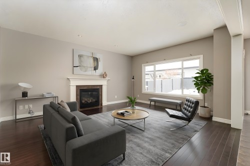 149 Sutton Close, Sherwood Park, AB - Indoor Photo Showing Living Room With Fireplace