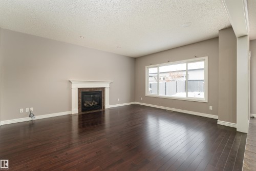 149 Sutton Close, Sherwood Park, AB - Indoor Photo Showing Living Room With Fireplace