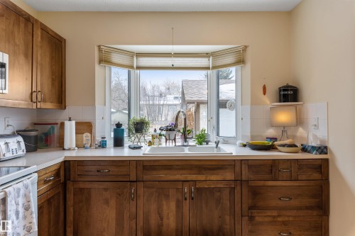 49 St Vital Avenue, St. Albert, AB - Indoor Photo Showing Kitchen With Double Sink