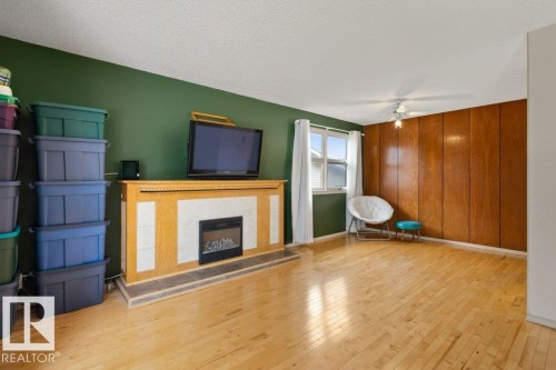 5006 55 Avenue, Stony Plain, AB - Indoor Photo Showing Living Room With Fireplace