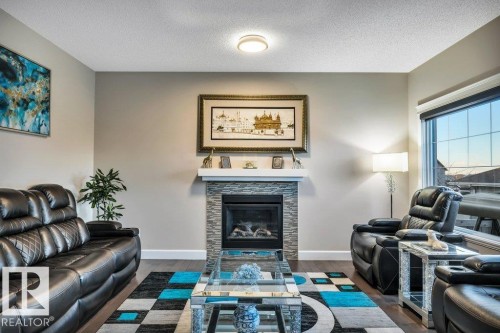 3671 8 Street, Edmonton, AB - Indoor Photo Showing Living Room With Fireplace