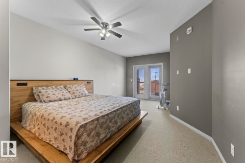 This room features light-colored walls and carpeted flooring - 107 801 11 Street, Cold Lake, AB - Indoor Photo Showing Bedroom