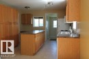 4909 51 Street, Elk Point, AB  - Indoor Photo Showing Kitchen With Double Sink 