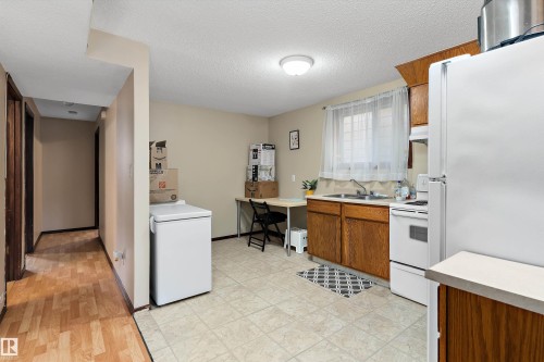 12914 69 Street, Edmonton, AB - Indoor Photo Showing Kitchen With Double Sink