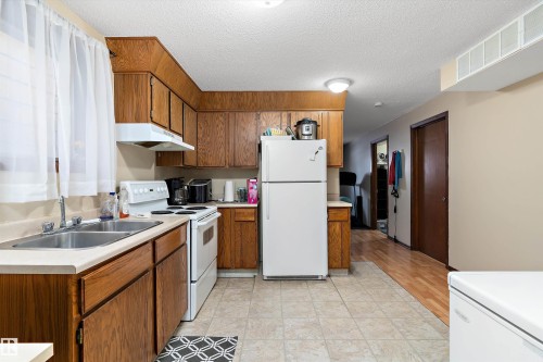 12914 69 Street, Edmonton, AB - Indoor Photo Showing Kitchen With Double Sink