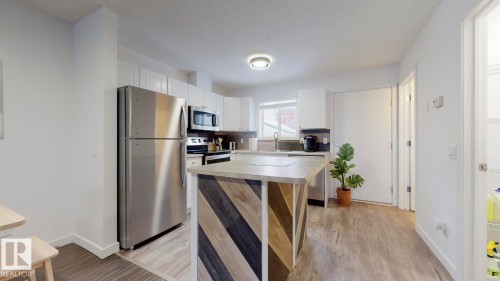 52 10909 106 Street, Edmonton, AB - Indoor Photo Showing Kitchen With Stainless Steel Kitchen