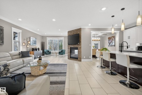 2003 Ainslie Link Link, Edmonton, AB - Indoor Photo Showing Other Room With Fireplace