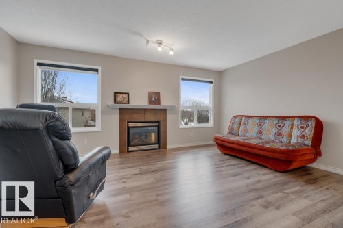 89 Erin Ridge Drive, St. Albert, AB - Indoor Photo Showing Living Room With Fireplace