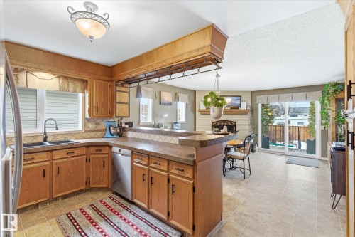 8427 152B Avenue, Edmonton, AB - Indoor Photo Showing Kitchen With Double Sink
