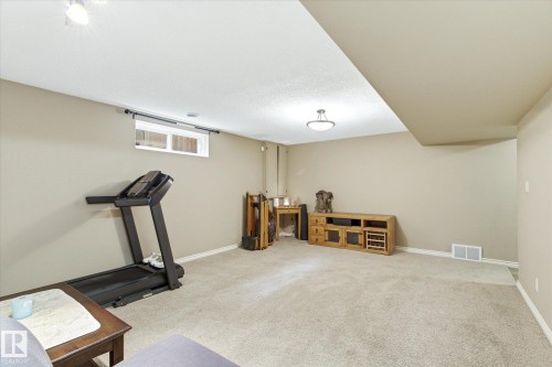 8427 152B Avenue, Edmonton, AB - Indoor Photo Showing Gym Room
