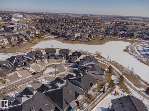 Aerial view of the surrounding neighborhood, featuring residential properties, a body of water, and walking paths - 2315 Ashcraft Cape, Edmonton, AB - Outdoor With View