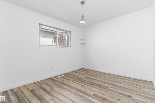 14'6"x10'3" - 6103-6105 97A Avenue, Edmonton, AB - Indoor Photo Showing Other Room