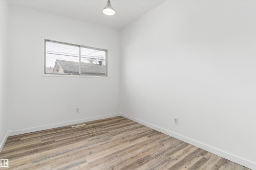 Bedroom 2 11'9"x8'9" - 6103-6105 97A Avenue, Edmonton, AB - Indoor Photo Showing Other Room