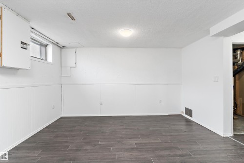 Basement living room - 6103-6105 97A Avenue, Edmonton, AB - Indoor Photo Showing Other Room