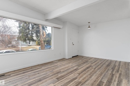 6103 14'2"x11'3" - 6103-6105 97A Avenue, Edmonton, AB - Indoor Photo Showing Other Room