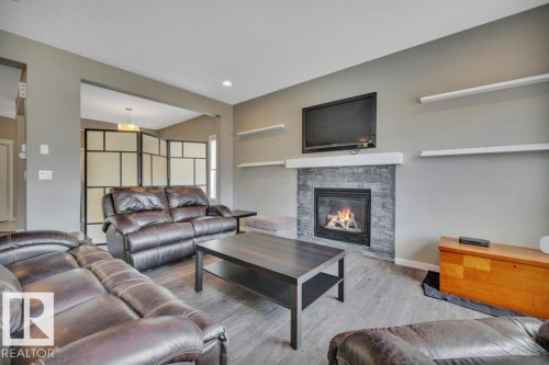 1844 56 Street, Edmonton, AB - Indoor Photo Showing Living Room With Fireplace