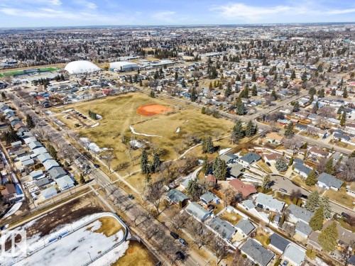 Aerial view showcasing the residential area with numerous houses and green spaces - 15926 92 Avenue, Edmonton, AB - Outdoor With View
