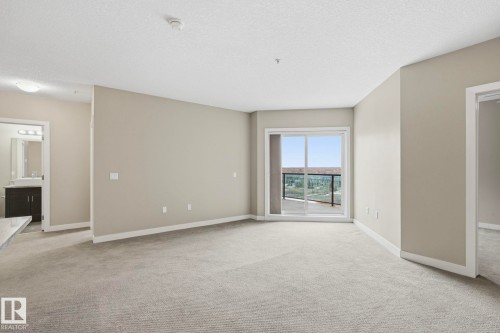 511 1230 Windermere Way, Edmonton, AB - Indoor Photo Showing Other Room