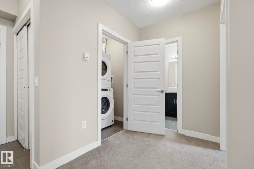 511 1230 Windermere Way, Edmonton, AB - Indoor Photo Showing Laundry Room