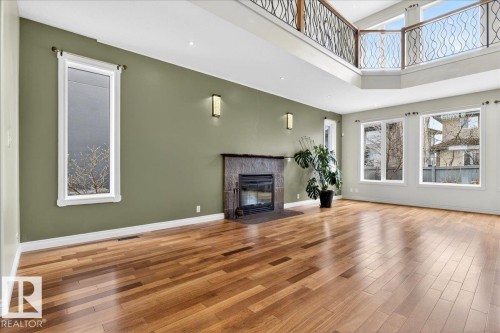 1004 Downey Way, Edmonton, AB - Indoor Photo Showing Living Room With Fireplace