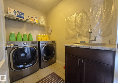 3308 18B Avenue, Edmonton, AB - Indoor Photo Showing Laundry Room