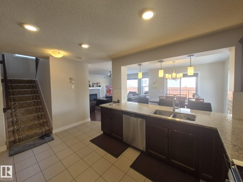 3308 18B Avenue, Edmonton, AB - Indoor Photo Showing Kitchen With Double Sink