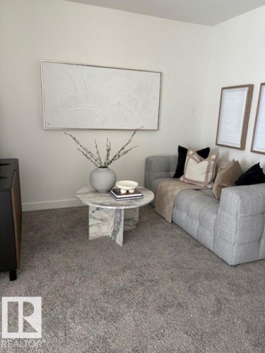 5039 Cawsey Link, Edmonton, AB - Indoor Photo Showing Living Room