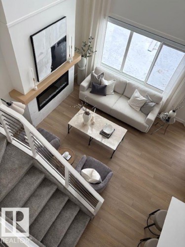 5039 Cawsey Link, Edmonton, AB - Indoor Photo Showing Living Room With Fireplace