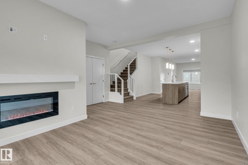 307 Brae Way, Leduc, AB - Indoor Photo Showing Living Room With Fireplace