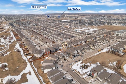 Aerial view showcasing a residential neighborhood with numerous properties, including a marked location for the property - 2630 16A Ave Nw, Edmonton, AB - Outdoor With View
