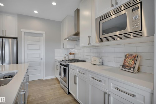 7490 Creighton Place, Edmonton, AB - Indoor Photo Showing Kitchen With Stainless Steel Kitchen With Double Sink With Upgraded Kitchen