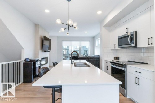 70 Westwind Drive, Spruce Grove, AB - Indoor Photo Showing Kitchen With Double Sink With Upgraded Kitchen