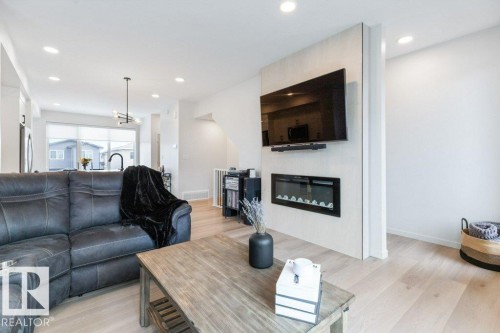 70 Westwind Drive, Spruce Grove, AB - Indoor Photo Showing Living Room With Fireplace