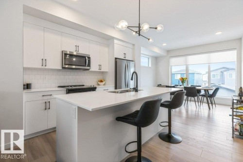 70 Westwind Drive, Spruce Grove, AB - Indoor Photo Showing Kitchen With Stainless Steel Kitchen With Double Sink With Upgraded Kitchen