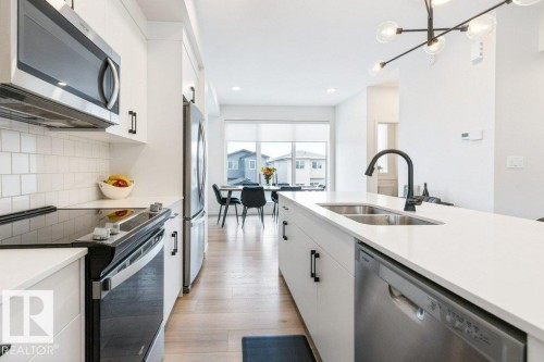 70 Westwind Drive, Spruce Grove, AB - Indoor Photo Showing Kitchen With Stainless Steel Kitchen With Double Sink With Upgraded Kitchen