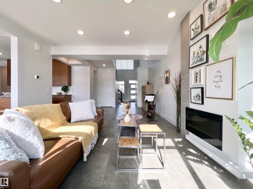 6055 King Landing Landing, Edmonton, AB - Indoor Photo Showing Living Room With Fireplace