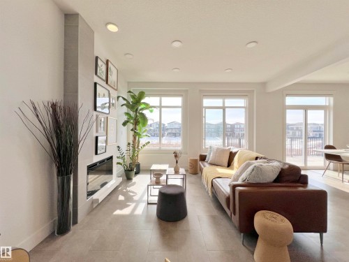 6055 King Landing Landing, Edmonton, AB - Indoor Photo Showing Living Room With Fireplace