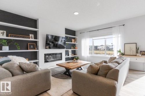 19147 22 Avenue, Edmonton, AB - Indoor Photo Showing Living Room With Fireplace