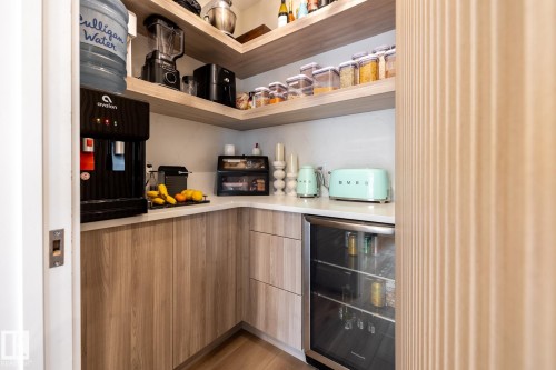 Walk in Pantry with Wine Fridge and Shelving - 9503 142 Street, Edmonton, AB - Indoor Photo Showing Other Room