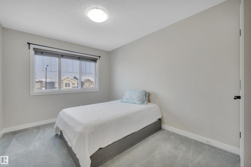 8021 Orchards Green, Edmonton, AB - Indoor Photo Showing Bedroom