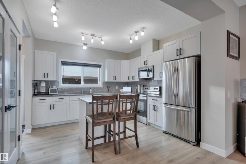 8021 Orchards Green, Edmonton, AB - Indoor Photo Showing Kitchen With Stainless Steel Kitchen