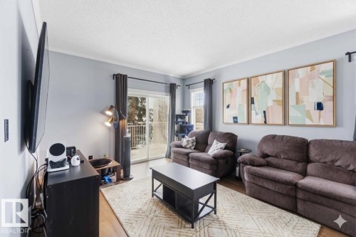 11 1179 Summerside Drive, Edmonton, AB - Indoor Photo Showing Living Room