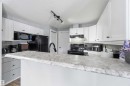 11 1179 Summerside Drive, Edmonton, AB  - Indoor Photo Showing Kitchen With Upgraded Kitchen 
