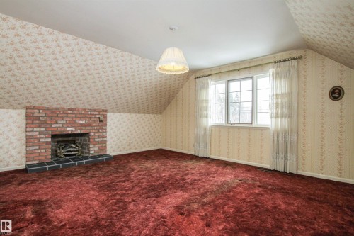 9539 88 Avenue, Edmonton, AB - Indoor Photo Showing Other Room With Fireplace