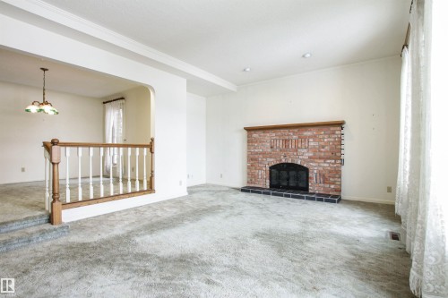 9539 88 Avenue, Edmonton, AB - Indoor Photo Showing Living Room With Fireplace