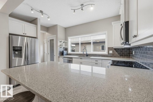 664 Secord Boulevard, Edmonton, AB - Indoor Photo Showing Kitchen With Stainless Steel Kitchen With Upgraded Kitchen