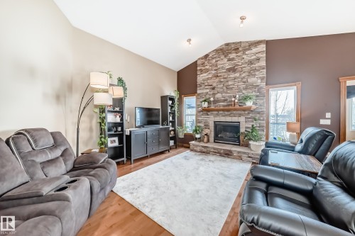 9 Linksview Cv, Spruce Grove, AB - Indoor Photo Showing Living Room With Fireplace
