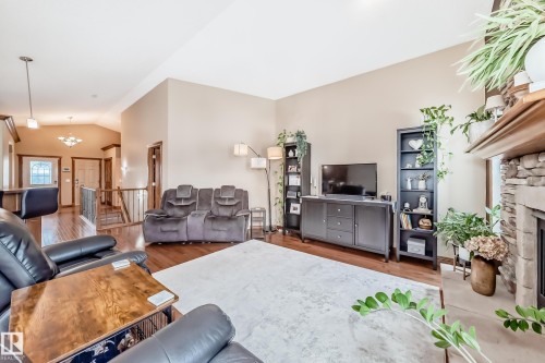 9 Linksview Cv, Spruce Grove, AB - Indoor Photo Showing Living Room With Fireplace