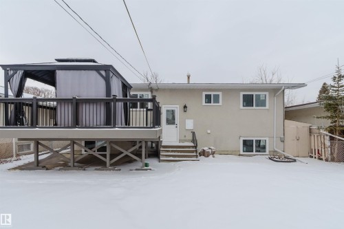 The property features a rear deck with a gazebo and a walk-out from the main level - 11528 42 Avenue, Edmonton, AB - Outdoor With Exterior