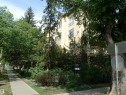 Multi-story residential building featuring a light-colored stucco exterior - 206 10208 120 Street, Edmonton, AB  - Outdoor 